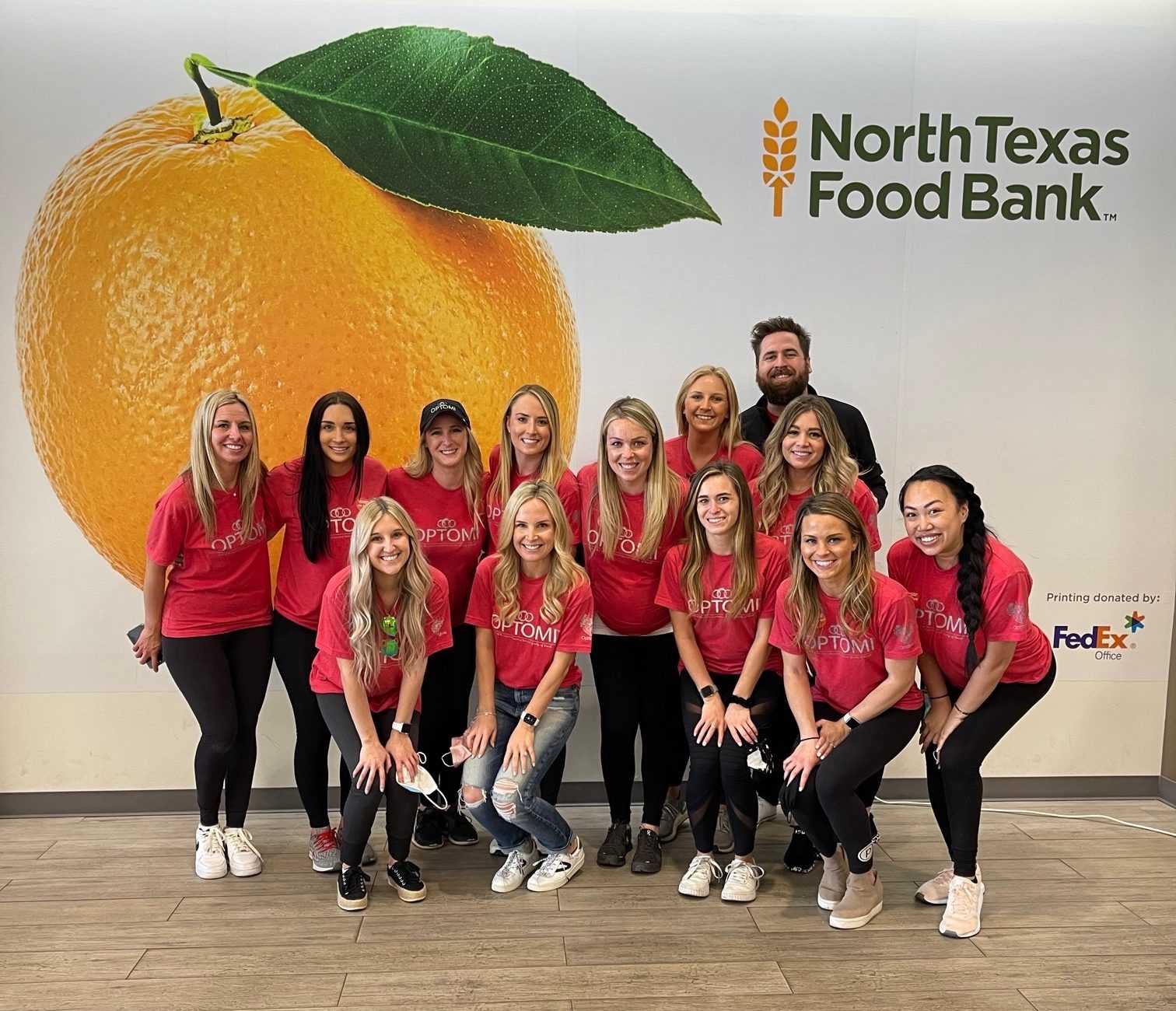 Optomi Dallas Gives Back to the North Texas Food Bank by Packing Meals for Food Insecure Children